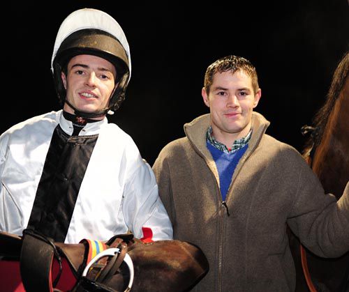 Matthew Smith pictured with jockey Ross O'Sullivan after his first winner at Dundalk in 2013