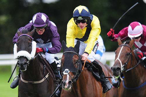 Elishpour (hood) is pushed out by Danny Mullins in the closing stages