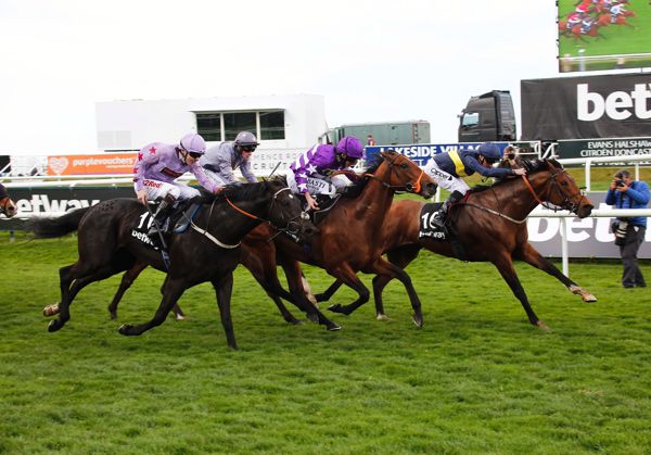 Bravery (right) winning the Lincoln under Danny Tudhope last year