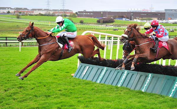 Paranoid and Davy Russell (left) lead eventual fourth
Rebel Waltz over the last 