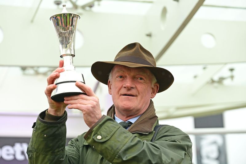Willie Mullins with his Champion Chase trophy