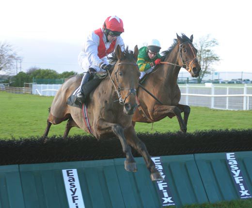 Judge Roy Bean (far side) jumps the final flight at Galway