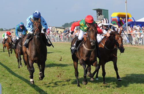 Miss Publican (red cap, centre) just prevails at Tramore