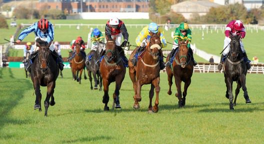 Kakagh and Robbie Colgan (left) finish late and fast to beat favourite Lucky William (noseband)