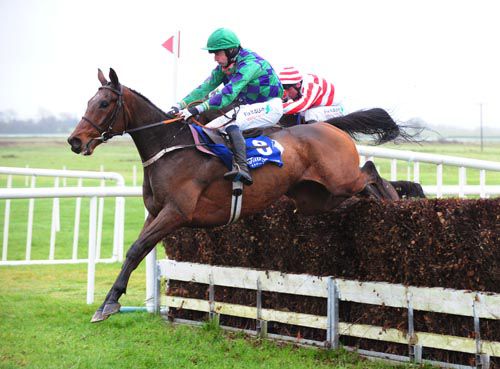 Leon Og (Roger Loughran up) jumps the last at Fairyhouse