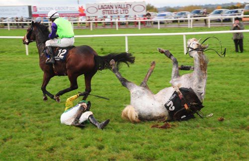 Corrick Bridge and Ruby Walsh crash out at the fifth fence