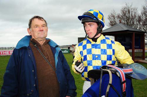 Trainer Harry Smyth and winning jockey Mattie Bowes