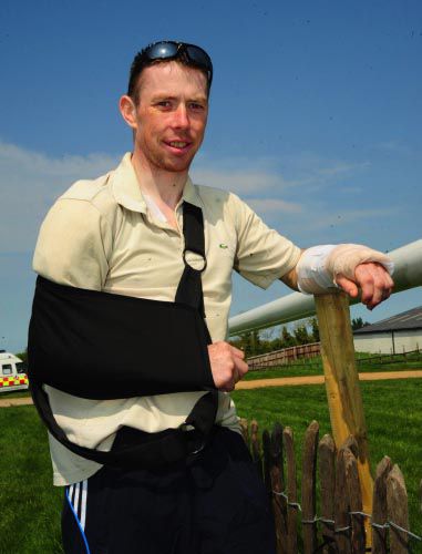 Andrew Lynch pictured back in May with his fractured arm and wrist