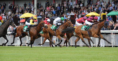 Six Of Hearts (no. 6) and Sam James win the Paddy Power Sprint 