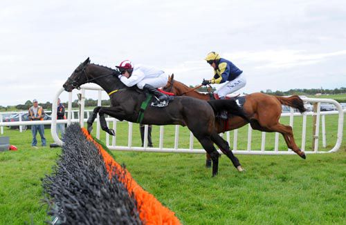 London Bridge under Paul Carberry jumps the last in front of Trendelenburg