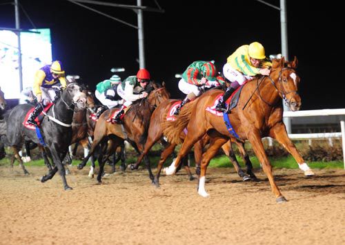 Keagan Latham pushes Piri Wango clear of the field in the opener at Dundalk tonight