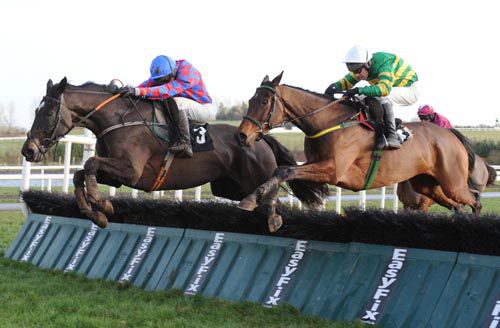 My Murphy (left) under Shay Barry jumps the last just ahead of Please Talk