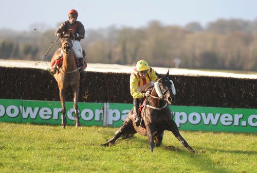 Belle Brook (Davy Russell) sprawls badly on landing at the last