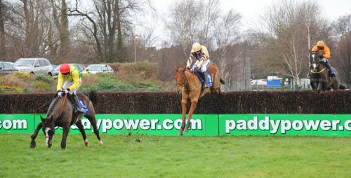Back In Focus, middle, follows Aupcharlie over the last at Leopardstown