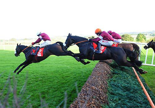 Toner D'Ourairies (number 5) jumps the second last fence