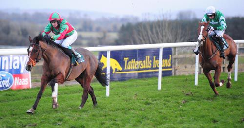 Hairy O'Malley is driven out by Padraig Roche to see off Bosman Rule and Patrick Mullins
