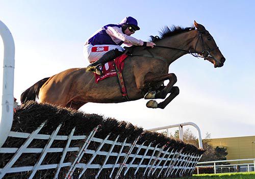 On Impulse flies over the last with Davy Russell in the saddle