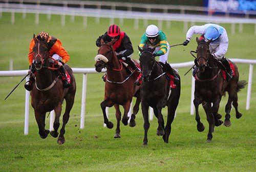 Kilclispeen, second right, lays down his challenge in Punchestown
