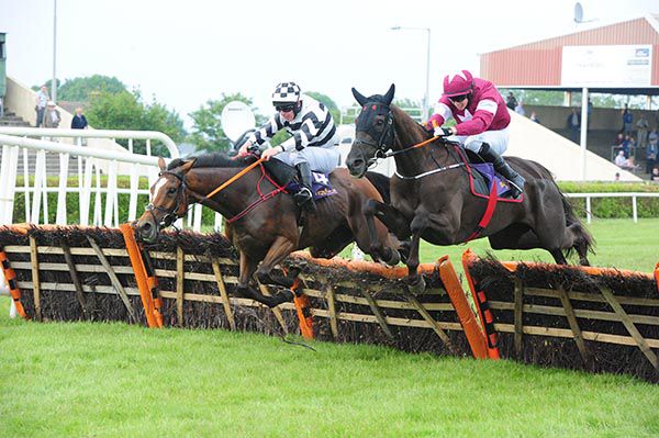 Morgan (nearside) and Special Diamond jump the last