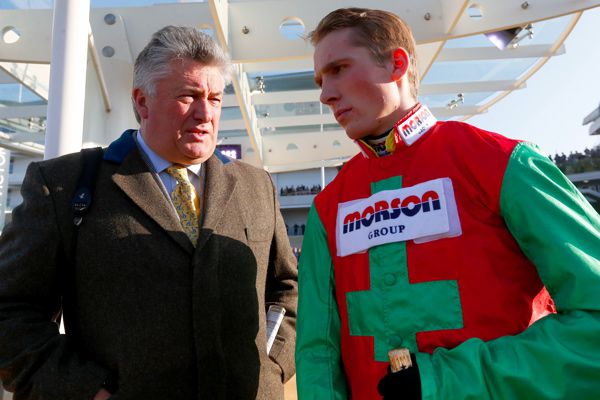 Harry Cobden pictured with trainer Paul Nicholls