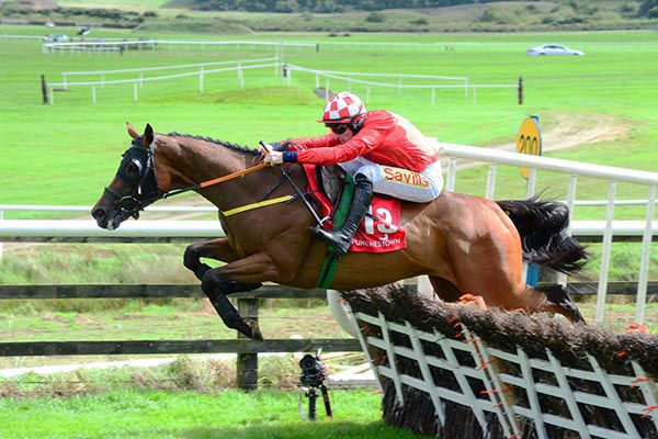    Red Gerry and Sean Flanagan jump the last 