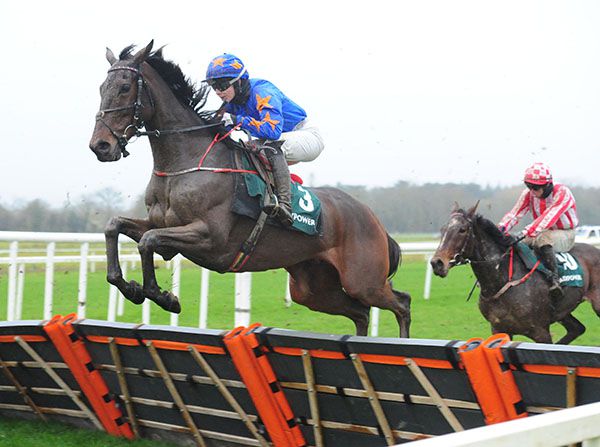 Dreal Deal (left) flies one of the early hurdles under Maxine O'Sullivan