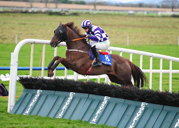 Mystic Embarr and Cathal McCormack jump the last