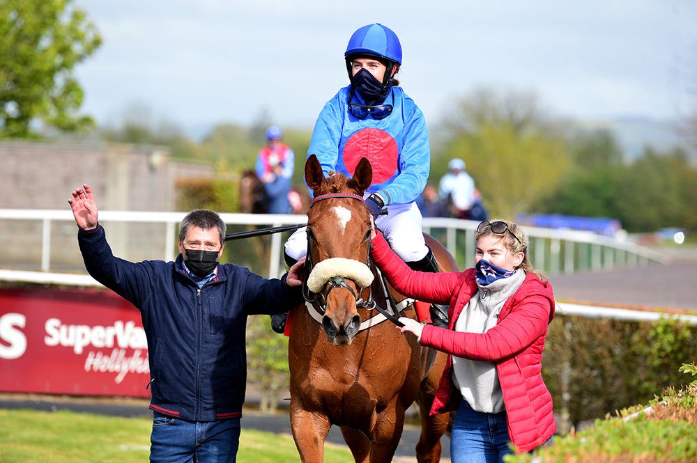 Battling Bessie returns with jockey Aoife Fahey, her Dad and trainer Jarlath and groom Sinead Fahey 
