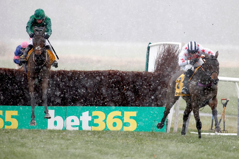 Aye Right and Callum Bewley (right) winning the Betfair Exchange Rehearsal Handicap Chase at Newcastle