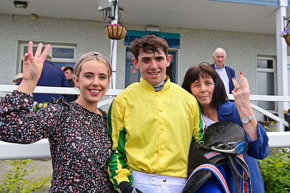 Darragh O'Keeffe pictured with Mum Catherine and sister Lauren after his Tramore treble