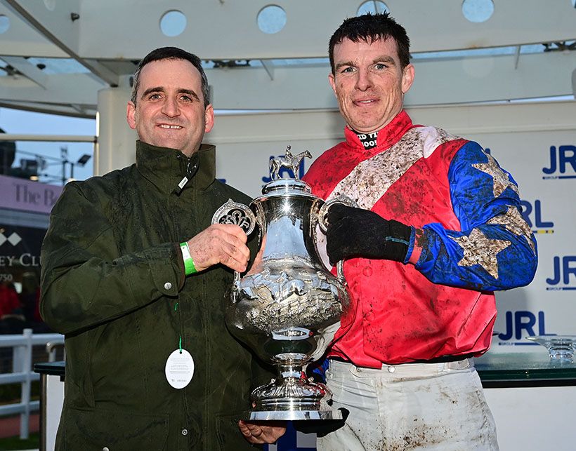 Sam Curling and Pa King pictured with the Kim Muir Trophy