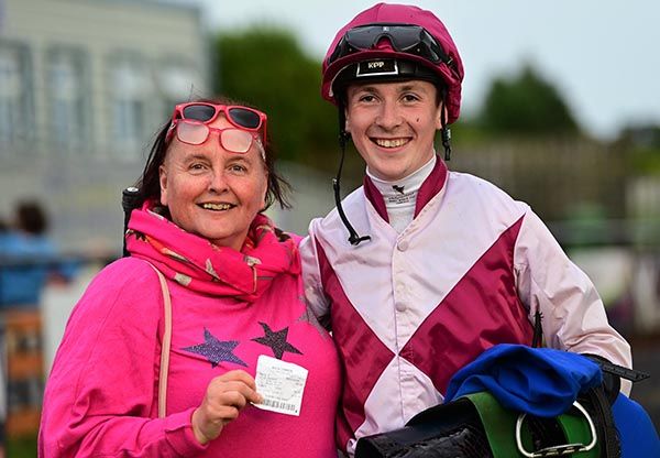 Mary Grehan celebrates a 200/1 winning bet with jockey Paddy Harnett 