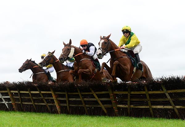 A great shot of First Dare and Maxine O'Sullivan (nearest) getting to the head of affairs