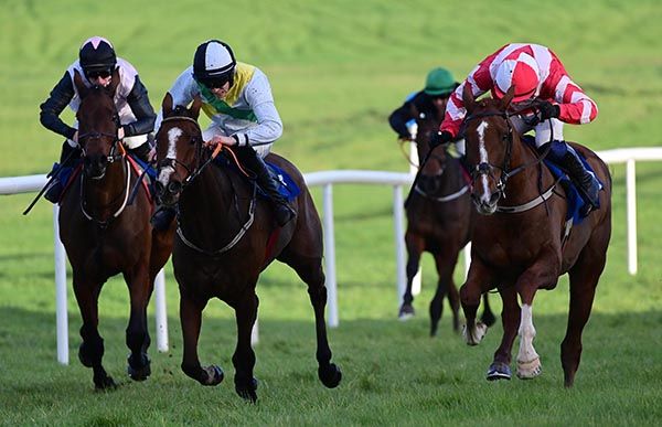 Lecky Watson (right) stays on best to beat Rushmount and Shannon Royale