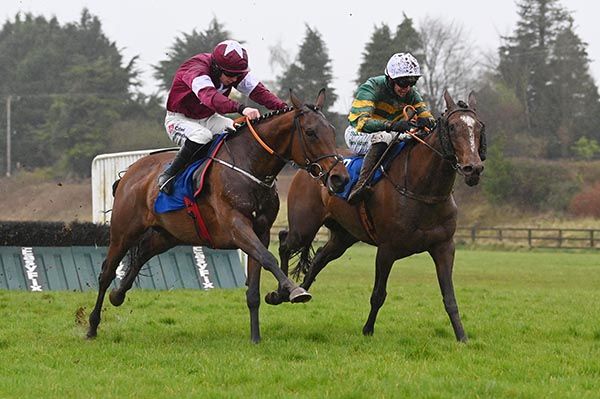 Miss Augusta (left) and Splashing Out battle out the finish