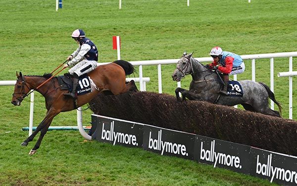 The Gradual Slope and Mark McDonagh right win the Colm Quinn BMW Handicap Steeplechase from Your Own Story.