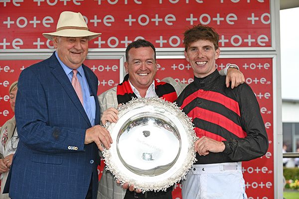 Noel Meade pictured with Donagh Meyler and owner Philip Polly after Pinkerton's win in the Tote Galway Plate 