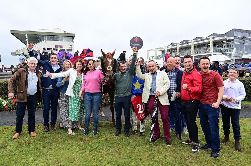 Sylkie and Rory Cleary with Sylkie Syndicate and trainer Danny Howard. 