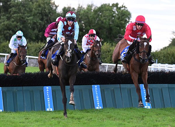 Coastal World (left) jumps the last alongside My Friend The Wind