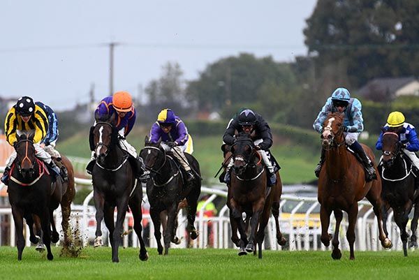 Billie Be Quick (orange cap) leads home her rivals