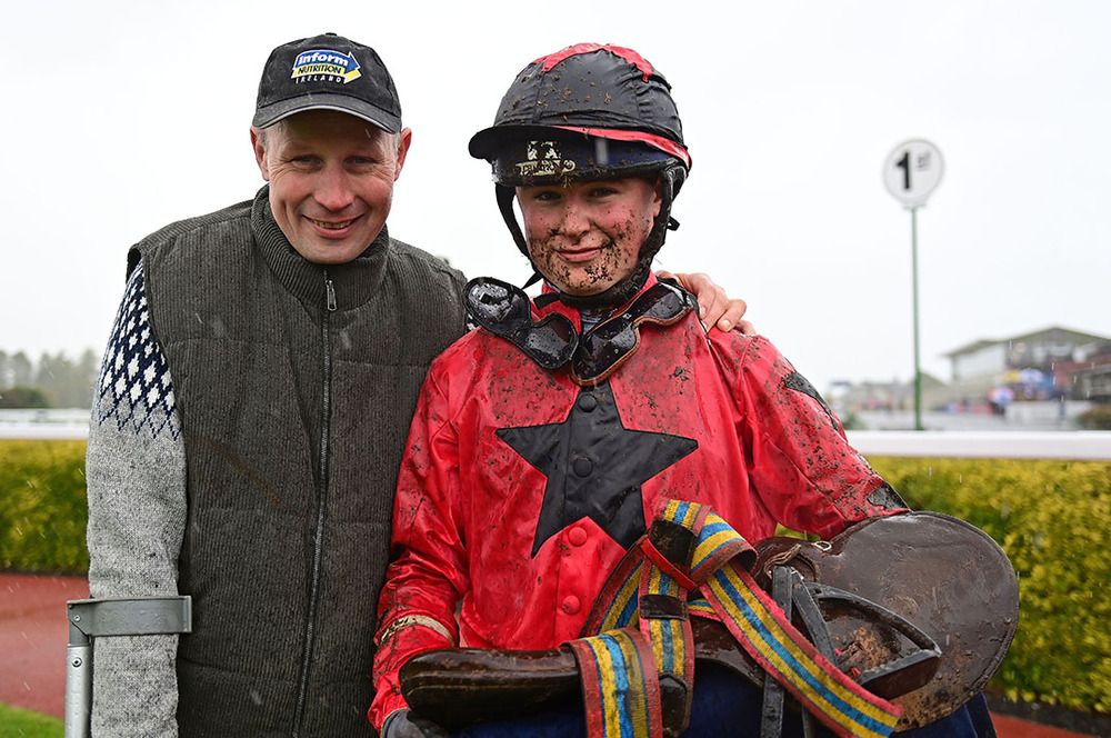 Alex Ott with his son Luke Burke-Ott after Inchidaly Copper's victory  