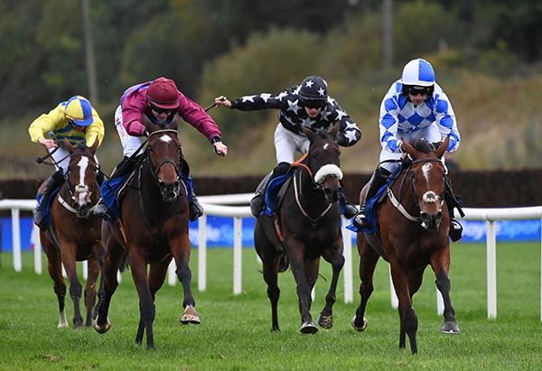 Patrick Mullins in the blue and white silks eases to victory aboard Korinthia