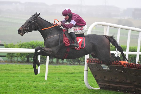 Patter Merchant and Sam Ewing jump the last