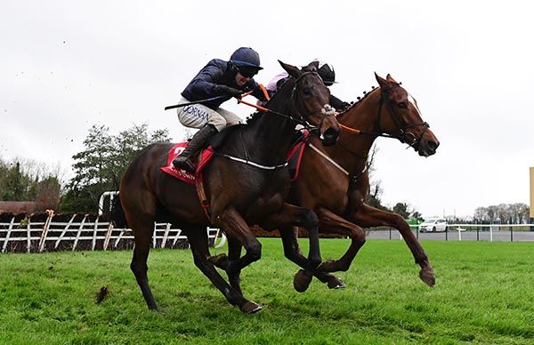 Butch Cassidy, near side, gets the better of Sermandzarak