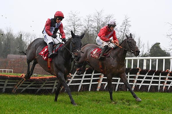 Saint Sam and eventual winner Ballyadam (right) clear the last together