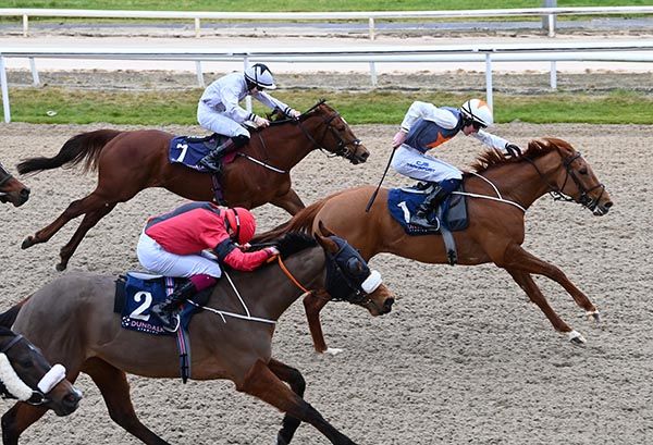 I'm Spartacus and Adam Caffrey lead Clonmacash (nearest)